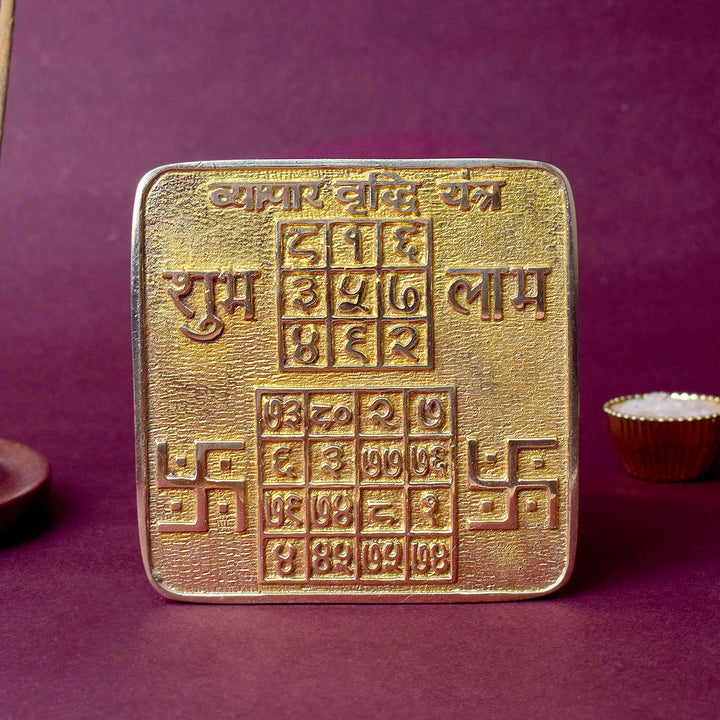 Energized Brass Vyapar Yantra for business success, engraved with divine symbols to attract financial prosperity, growth, and protection in commercial ventures. India’s Largest Pooja Accessories Brand - www.satvikstore.in
