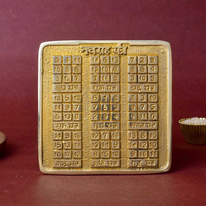 Brass Navgrah Yantra with sacred engravings of nine planetary symbols, designed for balancing astrological energies and removing graha doshas in home or office. India’s Largest Pooja Accessories Brand - www.satvikstore.in


