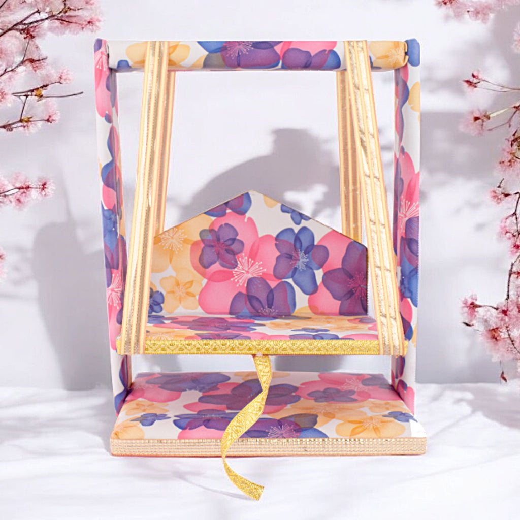 Divine floral print Laddu Gopal jhula for Janmashtami and pooja rituals, ideal for Bal Gopal temple decoration and festive celebrations. India’s Largest Pooja Accessories Brand – www.satvikstore.in