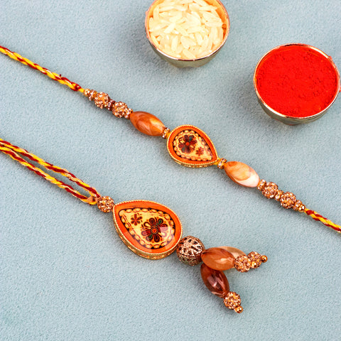 Elegant couple Rakhi set for brother and sister. India’s Largest Pooja Accessories Brand – www.satvikstore.in
