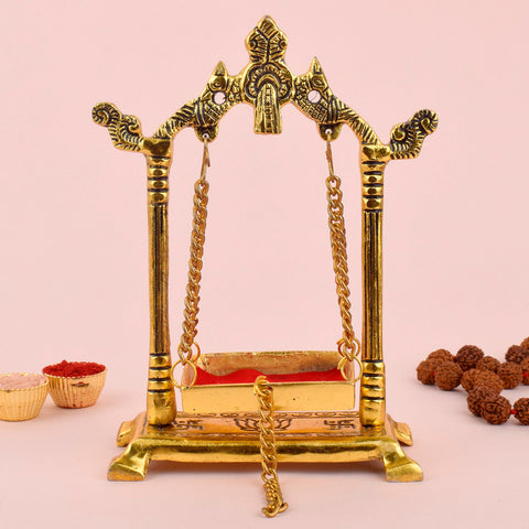 Elegant metal Laddu Gopal Jhula designed for Janmashtami celebrations, featuring intricate detailing and a traditional swing structure for pooja and home mandir décor. India’s Largest Pooja Accessories Brand – www.satvikstore.in
