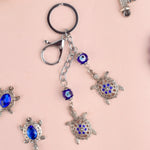 Evil Eye 2 Tier Turtle Metal Keychain – India's | Largest Pooja Accessories Brand – www.satvikstore.in