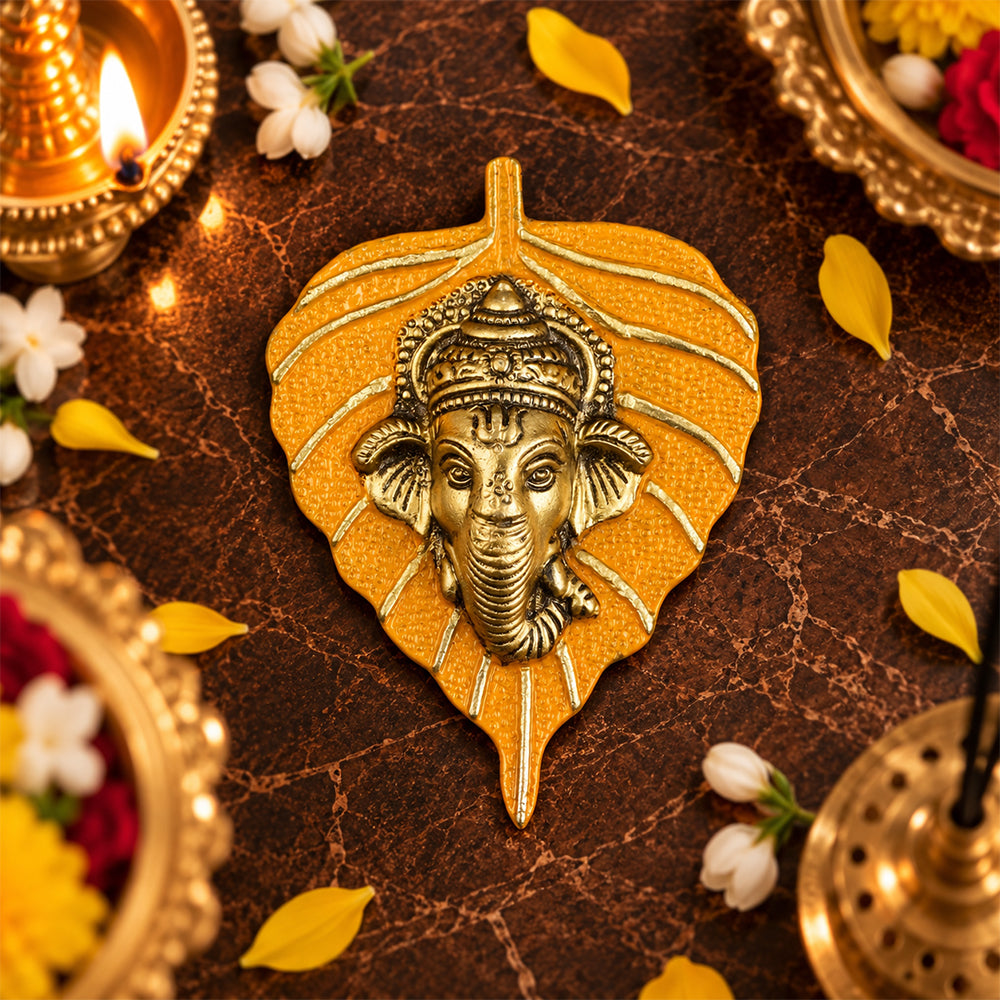 1 Pc Lord Ganesh Face on Leaf Patta Wall Hanging Yellow