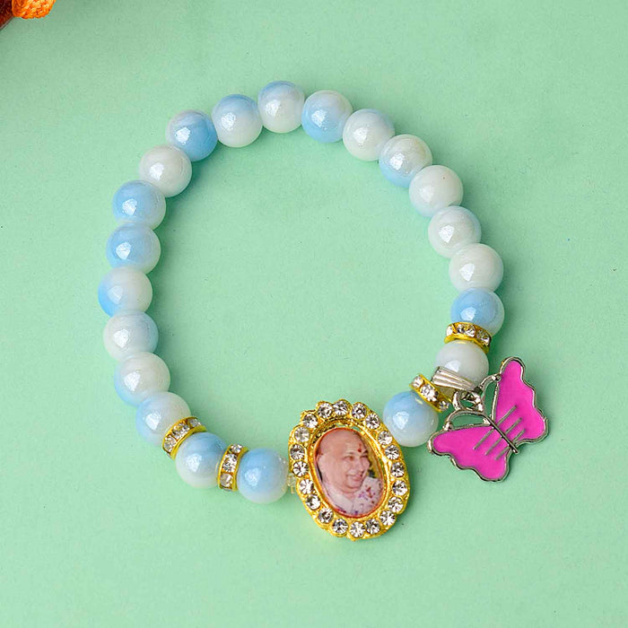 Graceful Guruji Swaroop Bracelet – assorted colored beads with charm – spiritual handmade bracelet – www.satvikstore.in