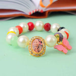 Guruji Swaroop Bracelet with pearls, multicoloured beads, and butterfly charm – ideal for satsangs, spiritual wear, or gifting. India’s Largest Pooja Accessories Brand – www.satvikstore.in