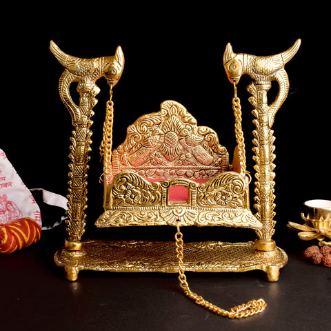 Handcrafted metal Peacock Jhula for Laddu Gopal with detailed peacock designs and colorful accents, ideal for temple décor and Janmashtami celebrations. India’s Largest Pooja Accessories Brand – www.satvikstore.in