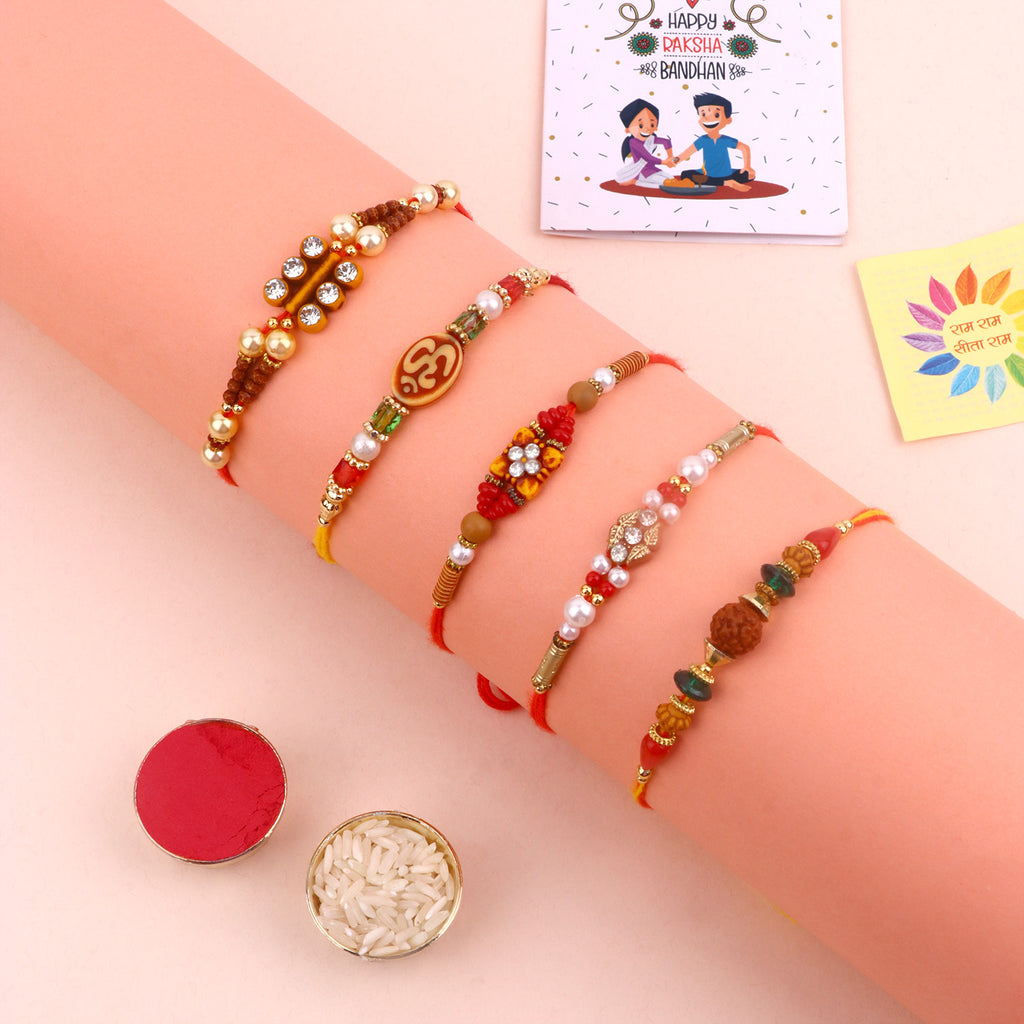 thumbnail image 2 of Buy IndoTribe Premium 7Pc Rakhi Set Rakhi For Brother And Bhabhi 4 Pc Rakhi Bracelet With 1 Diya, Roli & Akshat. Rakhee For Brother Raksha Bandhan Bracelet At 2 of 13