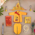 Kids' Krishna outfit featuring a yellow kurta and white dhoti, paired with traditional jewelry and shringar set, perfect for Janmashtami celebrations and festive occasions. India’s Largest Pooja Accessories Brand – www.satvikstore.in