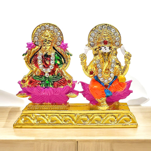 elegant Laxmi Ganesh idol made of metal, combining the revered deities Lakshmi and Ganesha. This intricately designed statue is a symbol of wealth, prosperity, and spiritual blessings, perfect for placement in your home or temple. India’s Largest Pooja Accessories Brand – www.satvikstore.in 