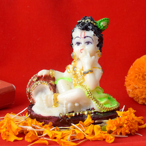 Marble Laddu Gopal Statue - A finely detailed marble statue of Laddu Gopal, depicting Lord Krishna in his childhood form, holding a laddu in his hand. This intricately designed idol symbolizes the playful and divine nature of Lord Krishna. India’s Largest Pooja Accessories Brand – www.satvikstore.in 