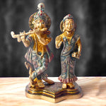 The 8 Inch Radha Krishna Idol – A Symbol of True Devotion and Love is a magnificent representation of the eternal bond between Radha and Krishna, capturing the purity and depth of their divine love. This beautifully crafted idol depicts Krishna playing his flute, while Radha stands beside him, radiating grace, love, and devotion.