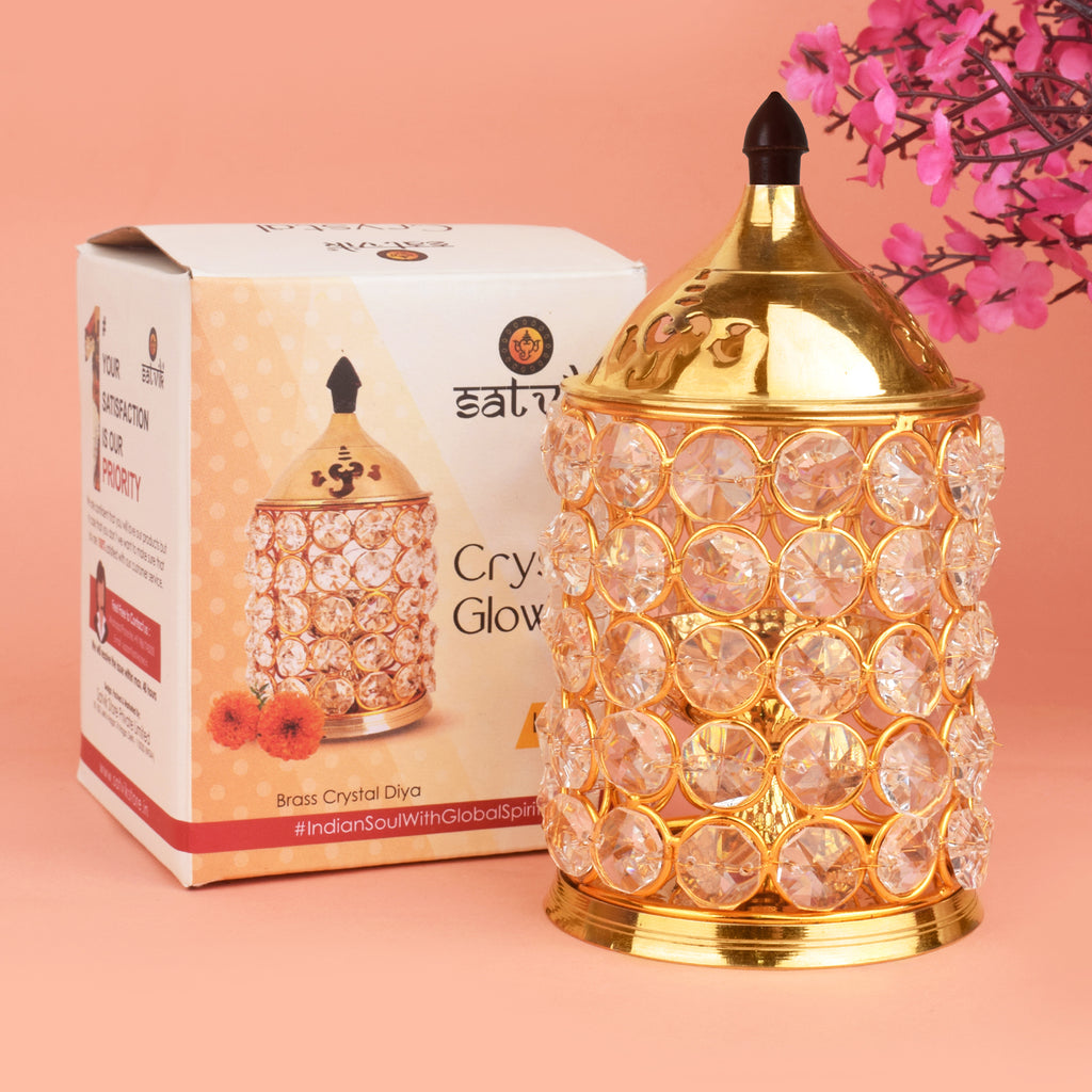 Pure Brass Crystal Glow Chimney Diya – A beautifully crafted diya made from pure brass, featuring a stunning crystal glow design. India’s Largest Pooja Accessories Brand – www.satvikstore.in