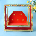Red Velvet and Meenakari handcrafted Laddu Gopal Jhula with ornate design, ideal for Bal Gopal during Janmashtami and pooja rituals. India’s Largest Pooja Accessories Brand – www.satvikstore.in