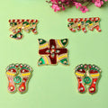 Shubh Labh and Swastik sticker set in vibrant red and gold, designed for auspicious decoration of home entrances, pooja rooms, and festive spaces. India’s Largest Pooja Accessories Brand – www.satvikstore.in 