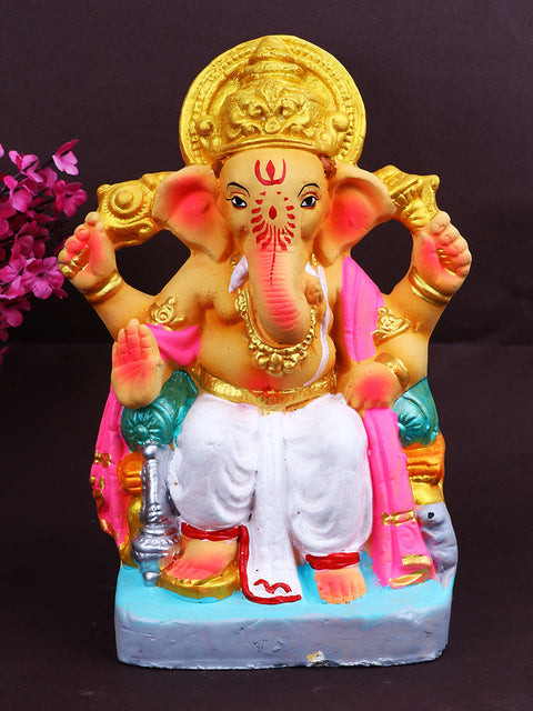 8.6-inch Tarun eco-friendly Ganpati idol in regal Raja pose, crafted from natural shadu clay with vibrant festive detailing.India’s Largest Pooja Accessories Brand – www.satvikstore.in