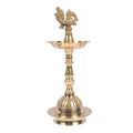 9.5 Inch Embossed Brass Peacock Kerala Samai Diya – Handcrafted brass diya with an embossed peacock design, perfect for pooja ceremonies, religious rituals, and spiritual occasions. India’s Largest Pooja Accessories Brand – www.satvikstore.in