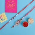Designer Couple Rakhi Set for Bhaiya and Bhabhi with Roli Chawal and Ram Sita Stickers – Raksha Bandhan Gift Combo. India’s Largest Brass Idols Brand - www.satvikstore.in