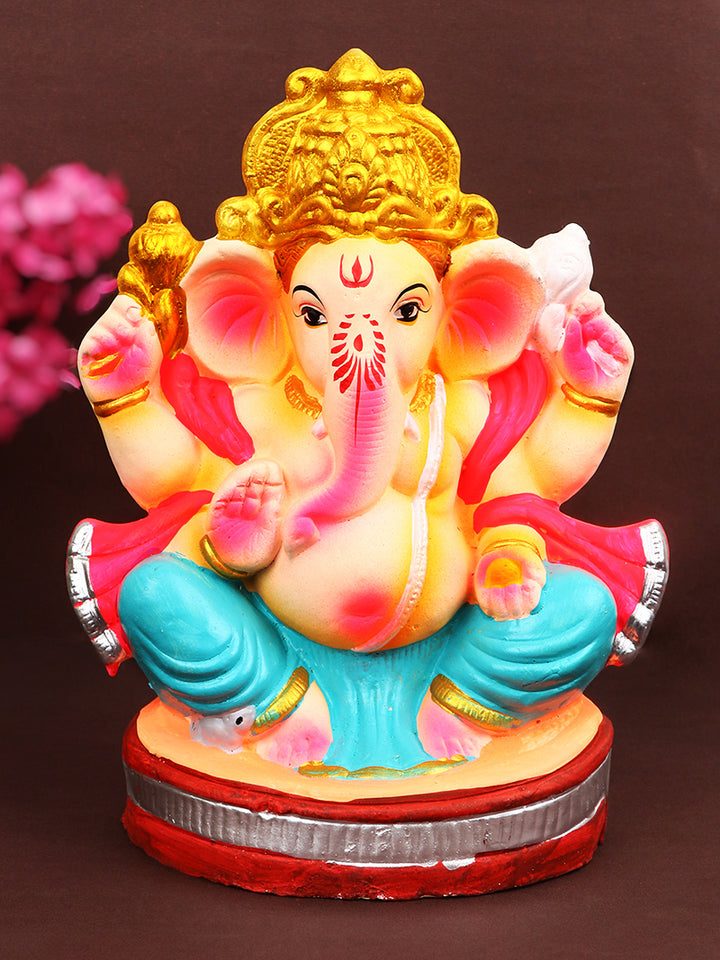 Beautifully sculpted 8-inch Vikat Ganesha idol in Padmasana pose, crafted from eco-friendly clay and adorned with serene, festive detailing. India’s Largest Pooja Accessories Brand – www.satvikstore.in