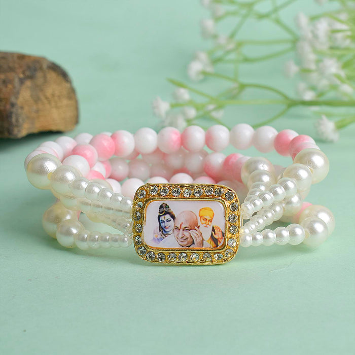 White & Pink Marble with White Pearl Four Layer Guruji Swaroop Bracelet featuring soft pink marble effect beads, elegant white beads, and luminous white pearls with Jai Guruji Swaroop – perfect for spiritual wear, festive gifting, and daily devotion. India’s Largest Pooja Accessories Brand – www.satvikstore.in