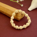 Wooden Radhe Bracelet with natural beads and Radhe nameplate – devotional wrist accessory for Radha Krishna bhakti and spiritual connection. India’s Largest Brass Idols Brand - www.satvikstore.in

