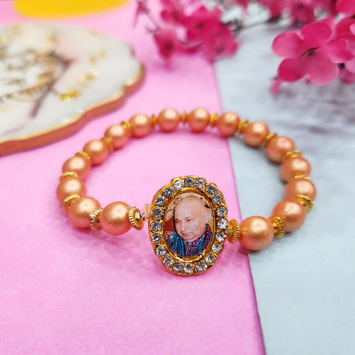 Orange Round Pearl Bracelet with Jai Guruji Swaroop
