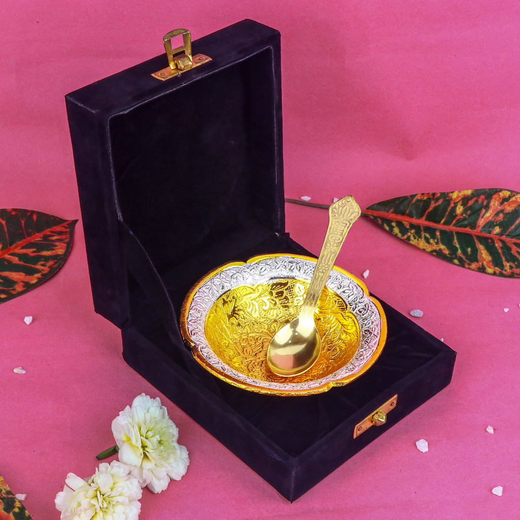 Decorative embossed golden bowl featuring four intricately carved faces at the base, ideal for pooja, festive décor, or as a spiritual centerpiece. India’s Largest Pooja Accessories Brand – www.satvikstore.in