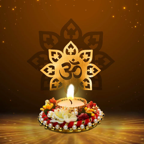 Beautiful Decorative OM Shadow Diya made of metal, casting a sacred 'OM' shadow when lit, ideal for spiritual ambiance, meditation, home temple décor, and festive lighting. India’s Largest Pooja Accessories Brand – www.satvikstore.in

