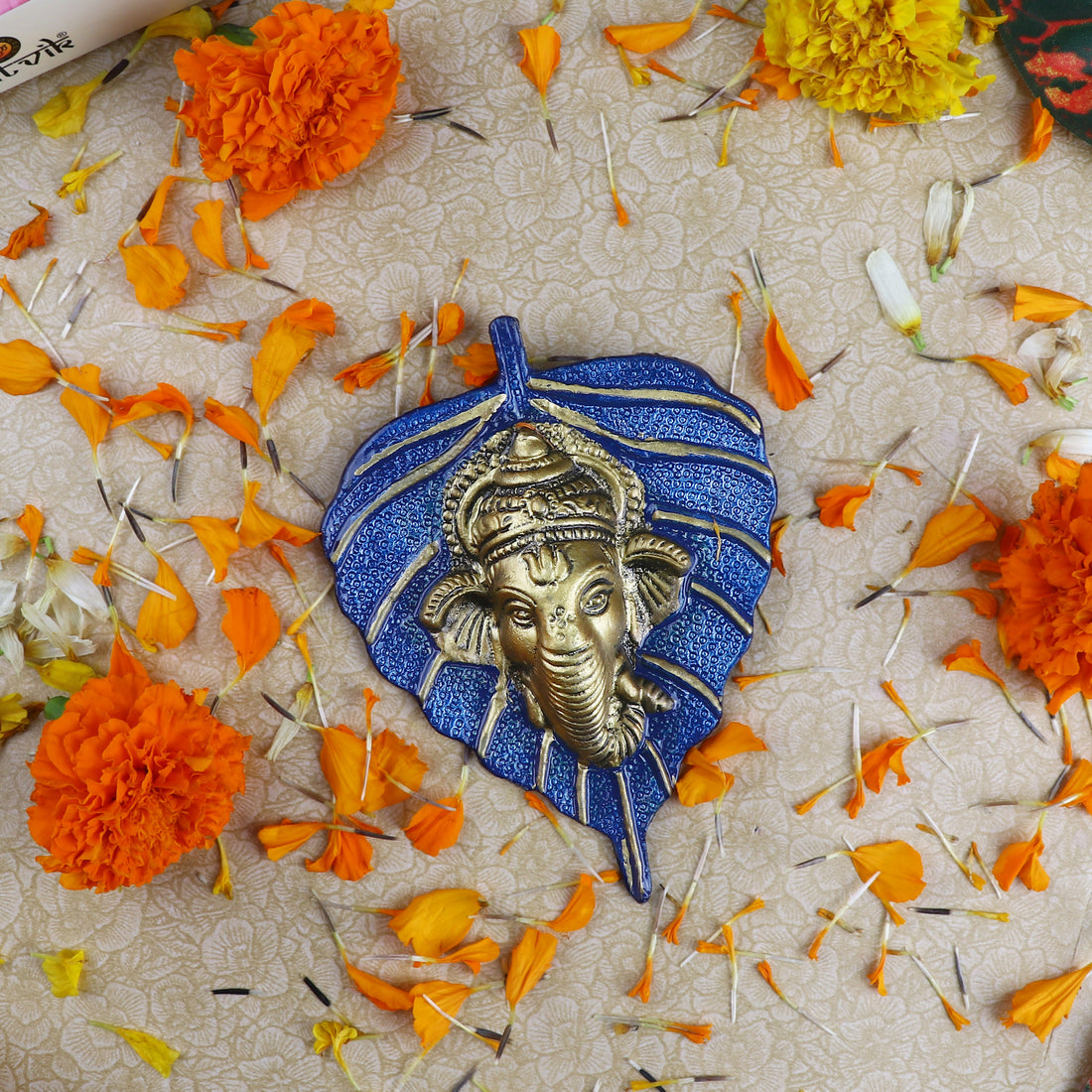 1 Pc Lord Ganesh Face on Leaf Patta Wall Hanging Yellow